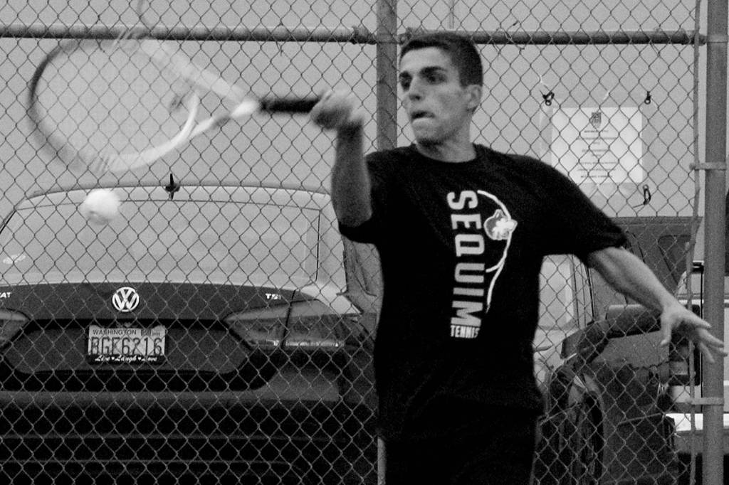Nico Zingaro returns a serve in the second set of his match against North Kitsaps Chris Schuchart on Sept. 25, which he would win 6-2 to win the match. Zingaro was Sequims only undefeated player on the week, not dropping a single set in three matches. Sequim Gazette photo by Conor Dowley
