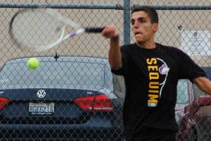 Nico Zingaro returns a serve in the second set of his match against North Kitsaps Chris Schuchart on Sept. 25, which he would win 6-2 to win the match. Zingaro was Sequims only undefeated player on the week, not dropping a single set in three matches. Sequim Gazette photo by Conor Dowley