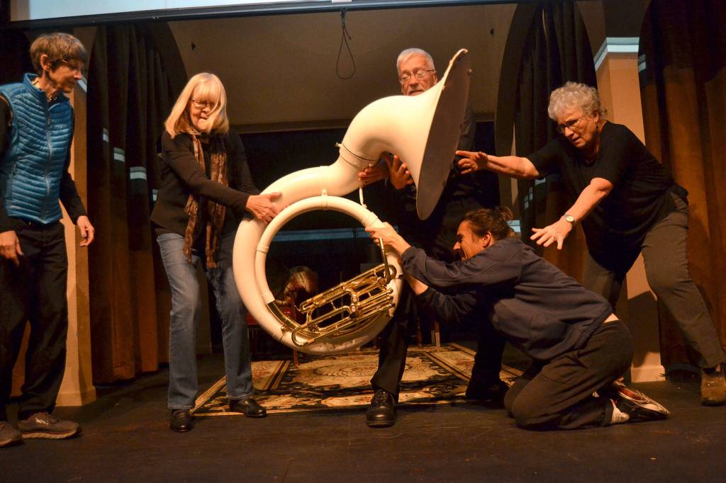 One of the OTA Moments shorts features Melissa Murray transferring a tuba in a narrow space with help from Jaye Butler, Olivia Shea, Greg Scherer, and Elaine Caldwell. OTA Moments features seven stories celebrating OTAs 40th season. Sequim Gazette photo by Matthew Nash