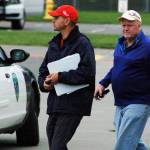 Vince Riccobene and interim Sequim School District superintendent Rob Clark walk by Sequim Middle School during the Criminal Mass Casualty Incident drill on Sept. 28. Riccobene was in charge of the districts coordination and planning of the drill, and both men observed the early parts of the drill from outside the school before heading to the unified command post for school, police, and fire personnel set up nearby. Sequim Gazette photo by Conor Dowley