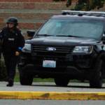 Officer Kindryn Leiter approaches Sequim Middle School during the Criminal Mass Casualty Incident drill on Sept. 28. Officers participating in the drill were not told of the exact location or situation of the incident within the school other than what would naturally come over dispatch, so as to force then to approach it with the kind of tactical thinking theyd employ in a live situation. Officers were also carrying training weapons and were checked before the drill to make sure they didnt accidentally have live weapons. Sequim Gazette photo by Conor Dowley