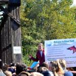 Jenna Ziogas, education coordinator for the Dungeness River Audubon Center, welcomes Greywolf Elementary fifth graders atop the Railroad Bridge as they ready to go to the Dungeness River Festival on Sept. 27. Sequim Gazette photos by Matthew Nash