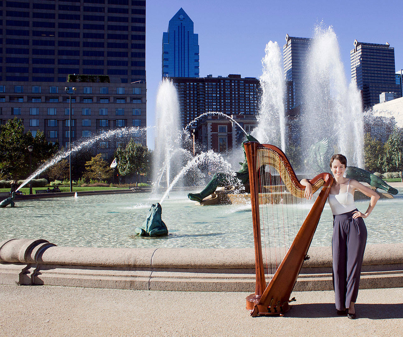 Caption for attached photo: Harpist Elizabeth Huston, seen here in Philadelphia, is a guest soloist with the Port Angeles Chamber Orchestra, performing in Sequim and Port Angeles this week. Photo by Ed Yungmann