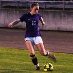 Abby Schroeder sends in a cross in the first half of Sequims 5-0 win over the Kingston Buccaneers on Oct. 3. Schroeder would eventually score two goals, one on either side of halftime, to give her a team-leading total of six goals scored this season. Sequim Gazette photo by Conor Dowley