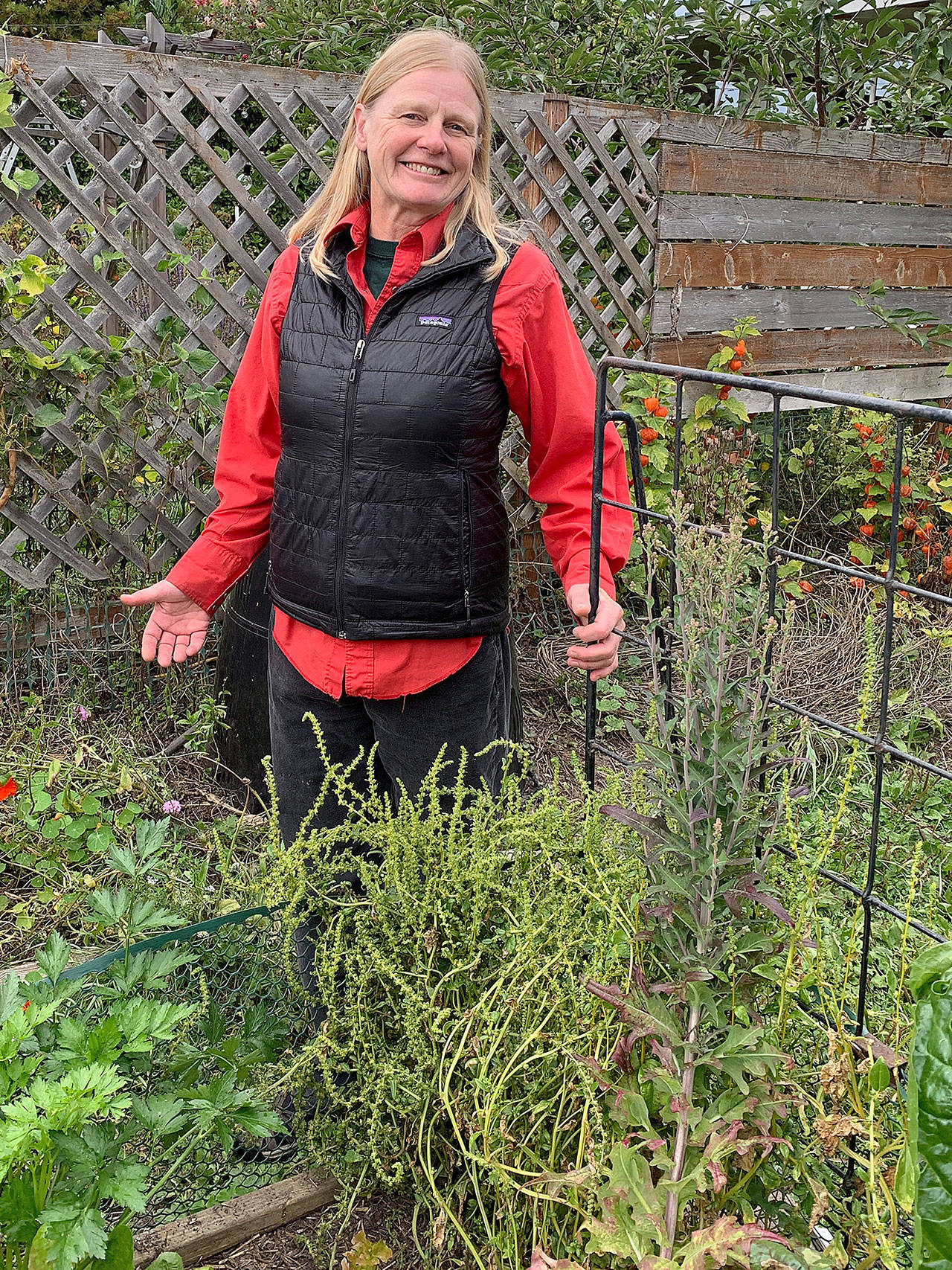 Selinda Barkhuis, pictured here in her vegetable garden where she uses intensive and organic practices to grow a wide variety of fruits, vegetables and herbs, is the featured speaker at the Green Thumb Gardening Tips Education Series on Oct. 24. Photo by Betty Harriman