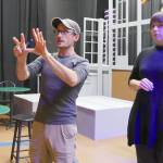 Director Josh Sutcliffe, center, works on presence with actor Ginny Holladay Jesse, with cast member Matt Forrest in the background, during a rehearsal for Silent Sky. Photo courtesy of Olympic Theatre Arts