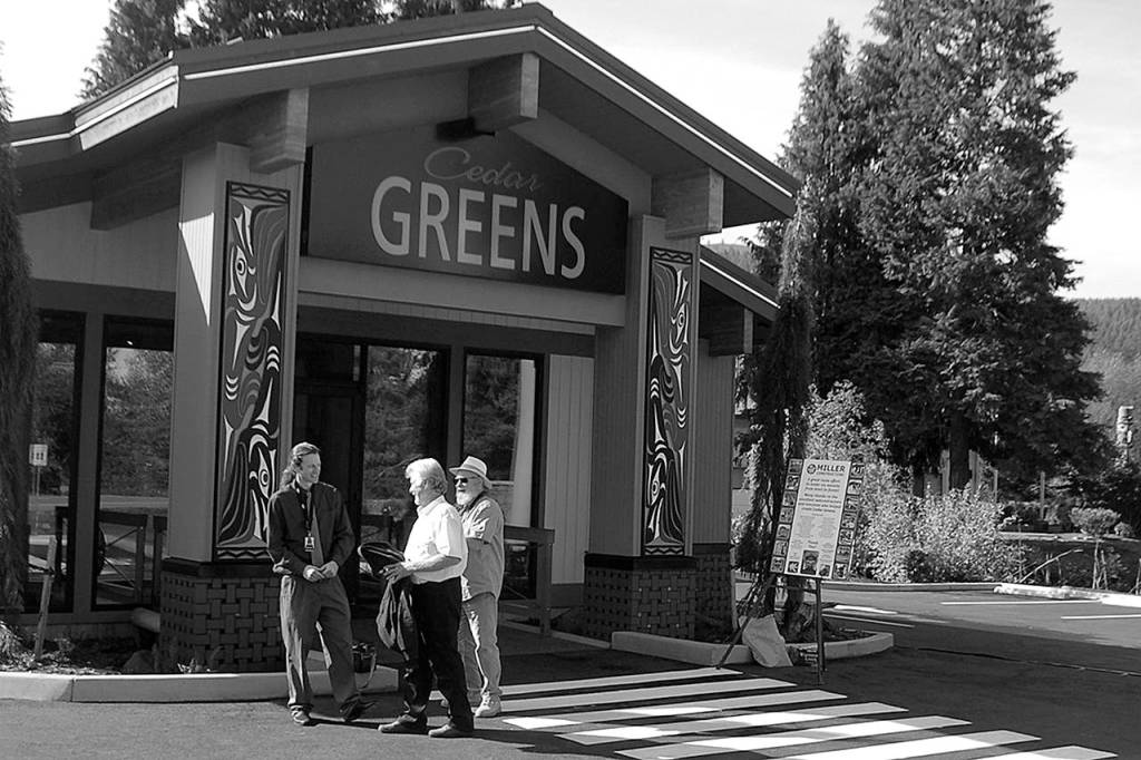 Cedar Greens general operations manager Mike Smith, left, speaks with two attendees of the grand opening for the Jamestown SKlallam Tribes new cannabis dispensary store. Sequim Gazette photo by Conor Dowley