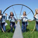 Sequim Irrigation Festival royalty, from left, Princess Gabi Simonson, Queen Erin Gordon, Princess Gracelyn Hurdlow, and Princess Eden Batson stand by a sprinkler on the Dick Family Farm during a photo shoot for the festivals programming in April 2018. The photo earned earned Sequim Gazette reporter Matthew Nash a first place award in the Color Portrait Photo category at the the Washington Newspaper Publishers Associations 2019 Better Newspaper Contest. Sequim Gazette photo by Matthew Nash