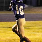 Junior wide receiver Garret Hoesel sets up to catch a 2-point conversion throw in the second quarter of the Sequim Wolves 37-14 win over the Olympic Trojans on Oct. 11. Hoesel only had one official reception on the night, but had a 59 yard interception return for a touchdown in the fourth quarter. Sequim Gazette photo by Conor Dowley