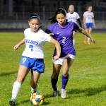 Sequims Kristina Mingoy, right, challenges Olympic forward Kaleia Sandbeck in the second half of Sequims 2-1 win over the visiting Trojans on Oct. 15. Sequim Gazette photo by Michael Dashiell