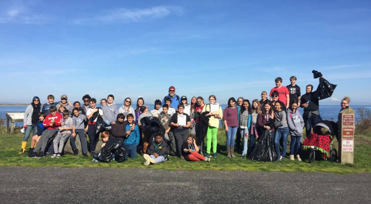 Olympic Peninsula Academy middle school students learn about ocean pH and salinity while doing a bit of clean up duty at local beaches  including Port Williams, pictured here  earlier this month. Photo courtesy of Nessa Goldman