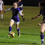 Sequim Wolves senior forward Daisy Ryan (third from left, 7) runs up the left wing on the ball with Abby Schoeder (second from right, 16) looking to receive a pass from her. This sequence lead to the Wolves opening goal against North Mason on Oct. 24, with Ryan assisting Hope Glasser, who would go on to score another goal in the Wolves 2-1 win. Sequim Gazette photo by Conor Dowley