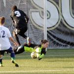 Sequim High senior goalkeeper Navy Thomas-Brenske makes a diving stop against Club Three Rivers (Pasco) on Nov. 2. Thomas-Brenske has played on Storm King teams for eight years. Sequim Gazette photos by Michael Dashiell