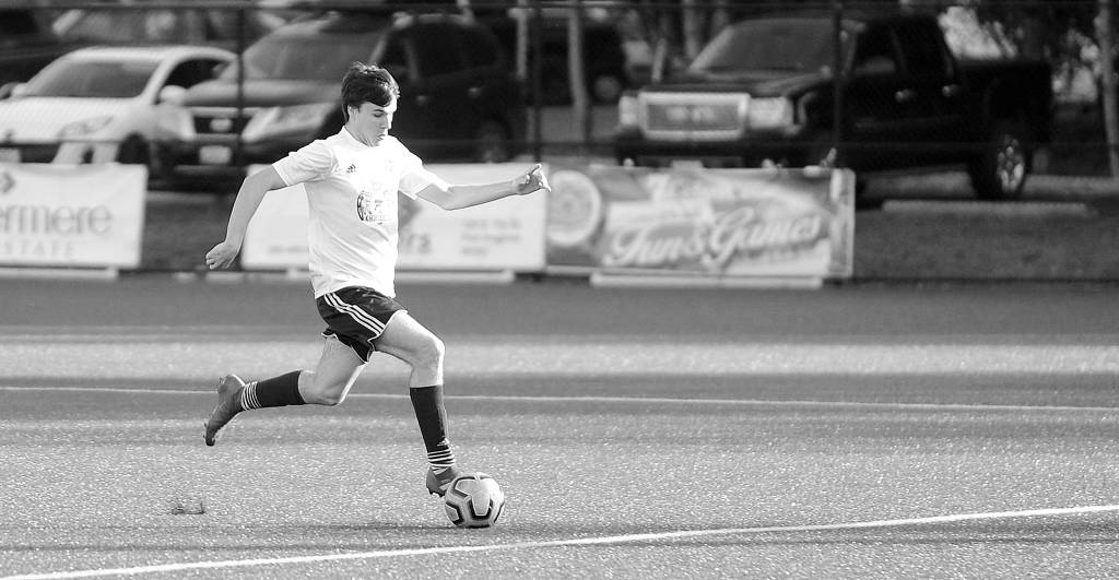 Port Angeles High standout Stuart Methner drives deep into enemy territory in a Nov. 2 match-up against Club Three Rivers (Pasco). Methner had Storm Kings lone goal in the peninsula club teams lone loss of the season.