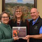 Karen Kuznek-Reese, retired Sequim city clerk, was honored in April for her support for domestic and sexual violence victims. Here she stands with Deputy Mayor Candace Pratt and Mayor Dennis Smith. In October, Sequim city councilors voted to rename the Civic Centers gallery after her. Sequim Gazette photo by Matthew Nash