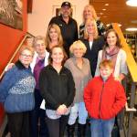 Family and friends gather to commemorate the Sequim Civic Center being named after longtime Sequim city clerk Karen Kuznek-Reese, who was unable to attend the occasion due to being in the hospital. There for the occasion were, top left, Robb Reese, husband, Paula Swisher, Washington Municipal Clerks Association (WMCA) president; second row, Carolyn Gallaway, Jefferson County deputy clerk, Virginia Olsen, WMCA immediate past president; third row, Helen Kuznek, mother, Mary Bower, retired Clallam Transit clerk, Joanna Sanders, City of Port Townsend clerk; bottom row, Sharon DelaBarre, past chairman City Arts Advisory Commission, Alicia Neal, daughter, and Brody Neal, grandson. Sequim Gazette photo by Matthew Nash