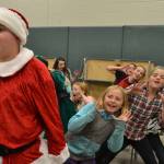 Santa Claus (Brock Hope) listens to his elves sing at a recent practice for Elf The Musical Jr. Sequim Gazette photo by Matthew Nash