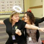 Helen Haller assistant principal Shelley Jefferson and counselor Jennifer Saul perform a skit for students during a Cougar Call Out assembly to demonstrate appropriate behavior. Photo by Patsene Dashiell