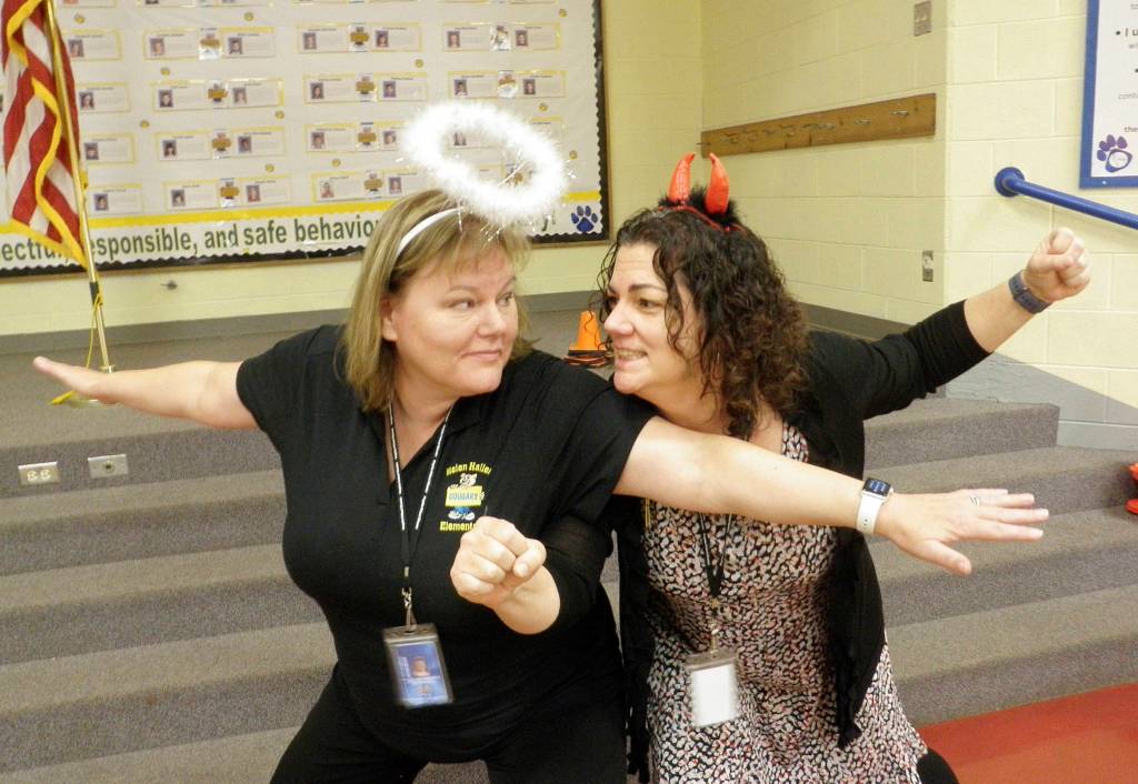 Helen Haller assistant principal Shelley Jefferson and counselor Jennifer Saul perform a skit for students during a Cougar Call Out assembly to demonstrate appropriate behavior. Photo by Patsene Dashiell