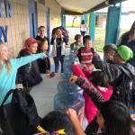 Student Council members (from left) Milla Rajala-Bruner, Nathanael Updike, Genevieve Wakefield, Ryan Weidman and Marelys Gonzalez assist students during Helen Haller Elementarys third-annual Penny Wars on Nov. 8. The council raised more than $600 that will go to supporting school-wide events and improving playground equipment for the 2019-2020 school year. Photo by Meredith Vincent