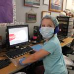 Greywolf teacher Sheri Burke joins students J.D. Kessler, Drake Cambell and Lucien Wolfley in a recent lesson in medicine. Photo by Darcy Lamb