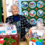Tatiana Trailov, one of the Sequim Guild of Seattle Childrens Hospital groups founding members, displays handmade wares at the guilds holiday bazaar in 2017. Submitted photo