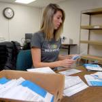 Sherry Price, voter registration coordinator for Clallam County, opens ballots during a count on Nov. 9 at the county courthouse in Port Angeles. Photo by Keith Thorpe/Peninsula Daily News