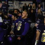 Seth Wilson (76) and other Sequim Wolves players celebrate with fans after their 37-21 district playoff win over the River Ridge Hawks on Nov. 8 to qualify for the 2A state playoffs for the second year in a row. Sequim Gazette photos by Conor Dowley