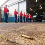 Members of the Mount Olympus Detachment of the Marine Corps League perform a three-volley rifle salute at the Veterans Day ceremony at U.S. Coast Guard Air Station/Sector Field Office Port Angeles on Monday. (Jesse Major/Peninsula Daily News)