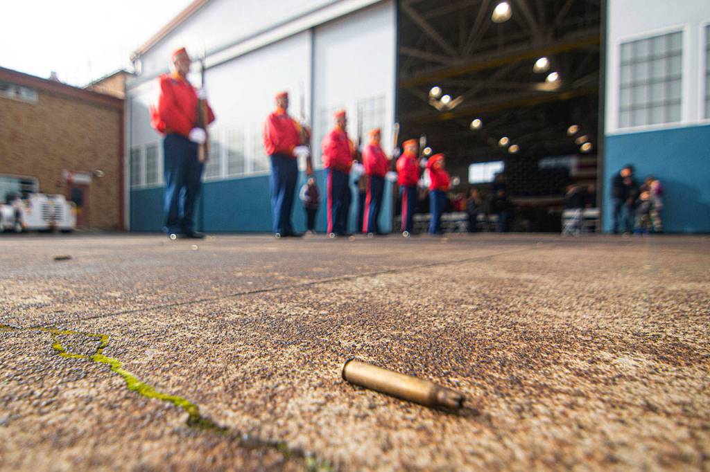 Members of the Mount Olympus Detachment of the Marine Corps League perform a three-volley rifle salute at the Veterans Day ceremony at U.S. Coast Guard Air Station/Sector Field Office Port Angeles on Monday. (Jesse Major/Peninsula Daily News)