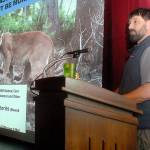 Mountain lion researcher Mark Elbroch gives a presentation on cougar interactions during a Studium Generale lecture at Peninsula College in Port Angeles in February 2018. Photo by Keith Thorpe/Peninsula Daily News