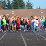 Helen Haller Elementary students begin the Turkey Trot last year on the Sequim School District track. The schools Parent Teacher Organization (PTO) seek $18,000 this year for the Six Books for Summer program to encourage students to read throughout the summer. Sequim Gazette file photo by Matthew Nash
