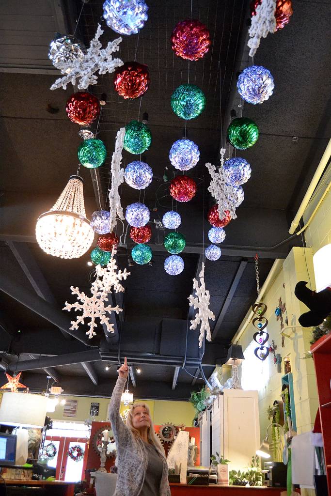 Assistant Manager Davene Work counts Decorate with Panaches inventory of Christmas balls hanging from the festive stores ceiling. Work joked that since theyve decorated it feels like they are a Christmas store that sells furniture. Sequim Gazette photos by Matthew Nash