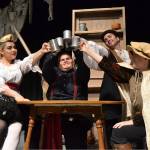 Friends, from left, Feste the Fool (Erin Quintero), Sir Toby (Kenzie Camp), Sir Andrew (Kaylee Dunlap) and Fabian (Jennessa Robinson) celebrate together in Shakespeares Twelfth Night. Below, Gloria Barrera Reyna as Antonieta helps Kyle DeSummas Sebastian regain his footing after he was thought lost at sea. Sequim Gazette photos by Matthew Nash