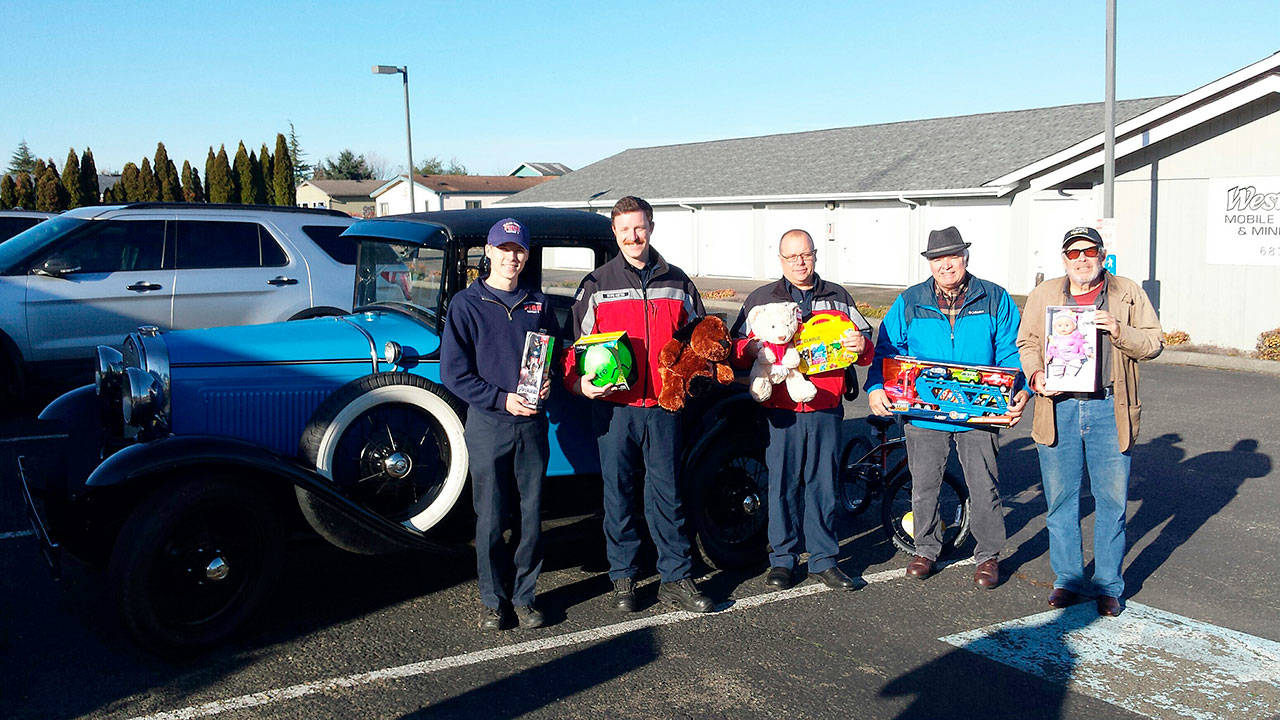 Milestone: Car club makes annual toy donation