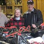 Eric Miner, Vivian Brown and Mark Schildknecht with some of the 237 Toys Vivian Donated to the 2019 Toys For Tots campaign. Photo by Jeff Brown