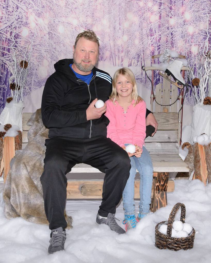 Jason Peters and daughter Kylie enjoy an evening of activities at Greywolf Elementarys Kids at Hope event on Dec. 3. Photo by Marilyn Westman