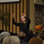Above, Director Louise Pluymen returns to lead the Sequim Community Christmas Chorus Dec. 6-8 in the Sequim Seventh-day Adventist Church. Her husband Rob is one of 70 singers to participate in the non-denominational group. Right, Rob Pluymen, a retired professional singer in Europe, sings two solos of Ave Maria and Panis Angelicus.