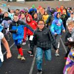 Tayshaun Williams runs with a pack of fellow fourth graders during Helen Haller Elementarys Turkey Trot on Nov. 27. More than 500 students participated in the event to raise funds for Six Books for Summer. Sequim Gazette photo by Matthew Nash
