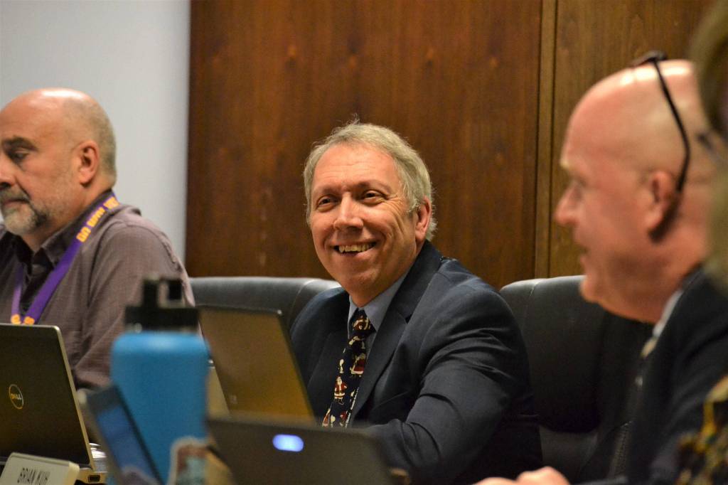 Brandino Gibson smiles after being unanimously elected president of the Sequim School Board on Dec. 2. Eric Pickens, not pictured, was also voted in as vice-president. Sequim Gazette photo by Matthew Nash