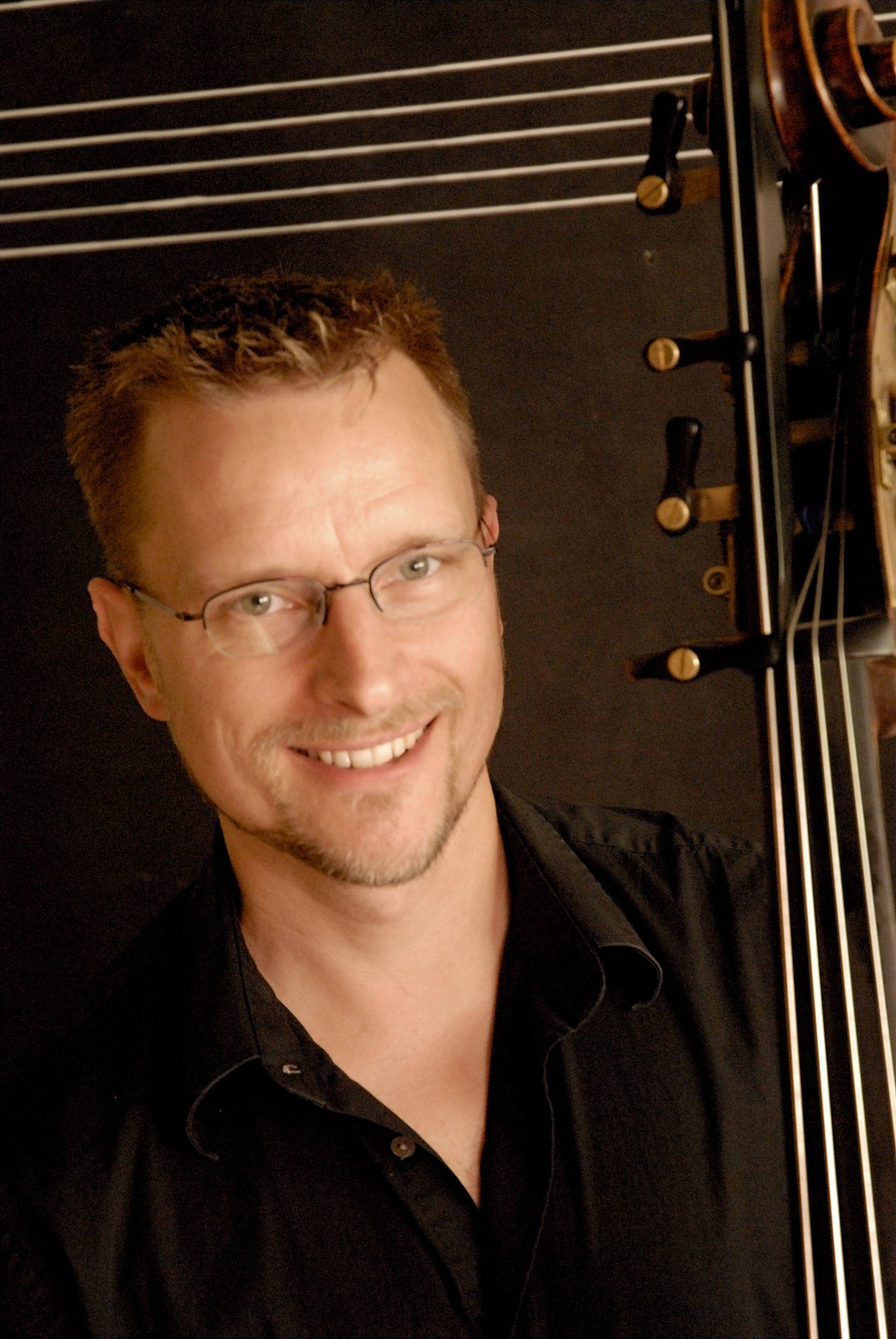 Double-bassist Steve Schermer is one of the guest soloists in the Port Angeles Symphony Orchestra and Chorus Holiday Favorites & Classics concert Saturday, Dec. 14. Submitted photo