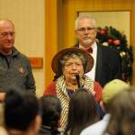 Jamestown SKlallam Tribe storyteller Elaine Grinnell speaks at the tribes MAT clinic design event on Dec. 5 in Sequim. Behind her are Brent Simcosky, the tribes health services director and Bud Turner, manager of the Jamestown SKlallam carving shed.