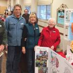 The Sequim Botanical Garden Society hosts a Surprise Peony Pack Fundraising Effort on Dec. 21 at the Sequim Farmers Market Holiday Fair. Pictured, from left, are society members John Hassel, Randy Smith, Sherry Smith and Dona Brock. Submitted photo