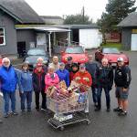 Car club keeps tradition cruising at food bank