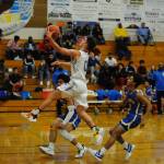 Sequims Dallin Despain (0) goes up for a fast-break layup in the second quarter of the Sequim Wolves 77-62 loss to the Bremerton Knights on Dec. 17.