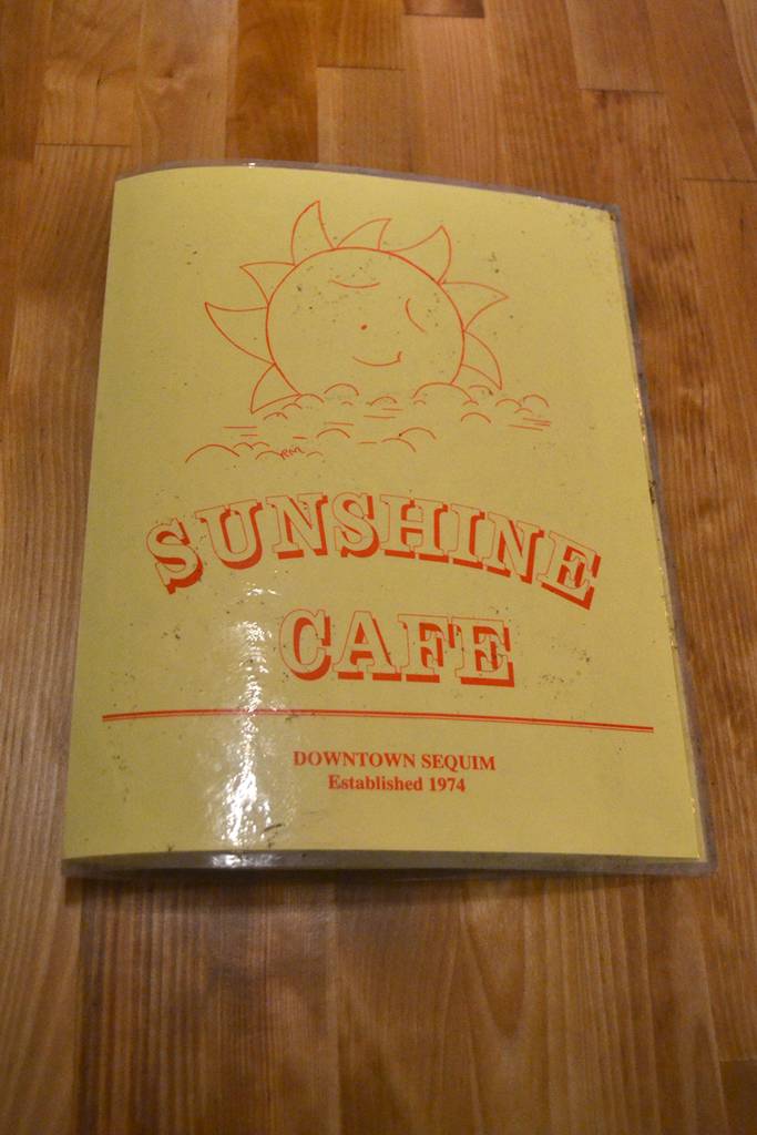 One surprise found during the remodel of the Sunshine Café was an old menu from the original eatery in the 1970s hidden behind old cupboards. Sequim Gazette photo by Matthew Nash