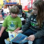 Fifth-grader Clinton Cosio, right, reads with first-grader Dusty Jenkins. Photo by Patsene Dashiell