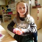 Kindergartener Emma Staub works with pipe cleaners to create and learn about shapes. Photos by Patsene Dashiell
