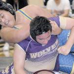 Wrestling: Sequim grapplers compete at Axe, Hawkins tourneys