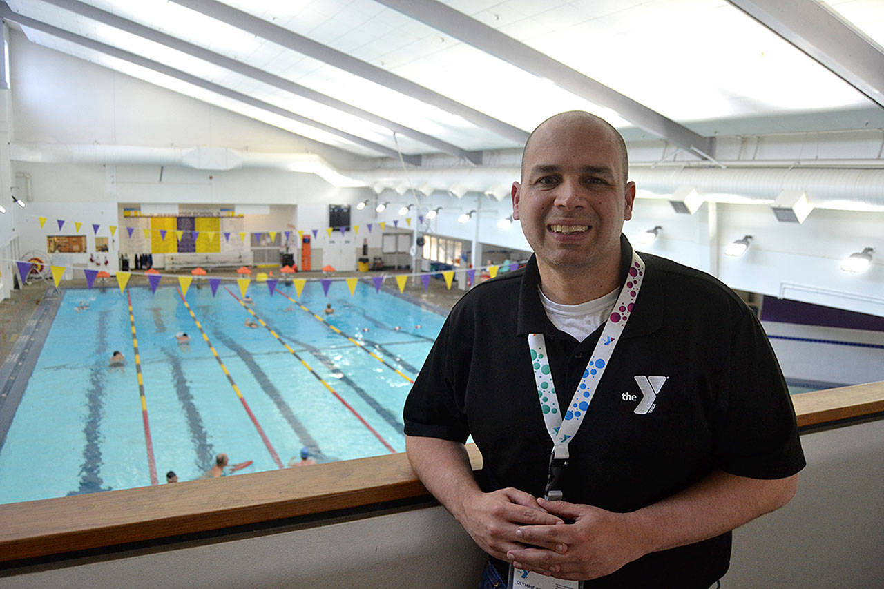 Kurt Turner, executive director of the YMCA of Sequim, overlooks the pool during the last week of work leading the facility. He helped ready it for opening in October 2016 and gain more than 6,000 members in his tenure. Hes leaving to take over multiple YMCA branches near Austin, Texas. Sequim Gazette photo by Matthew Nash